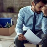 O ciclo oculto que liga suas dívidas ao corte de empregos no varejo